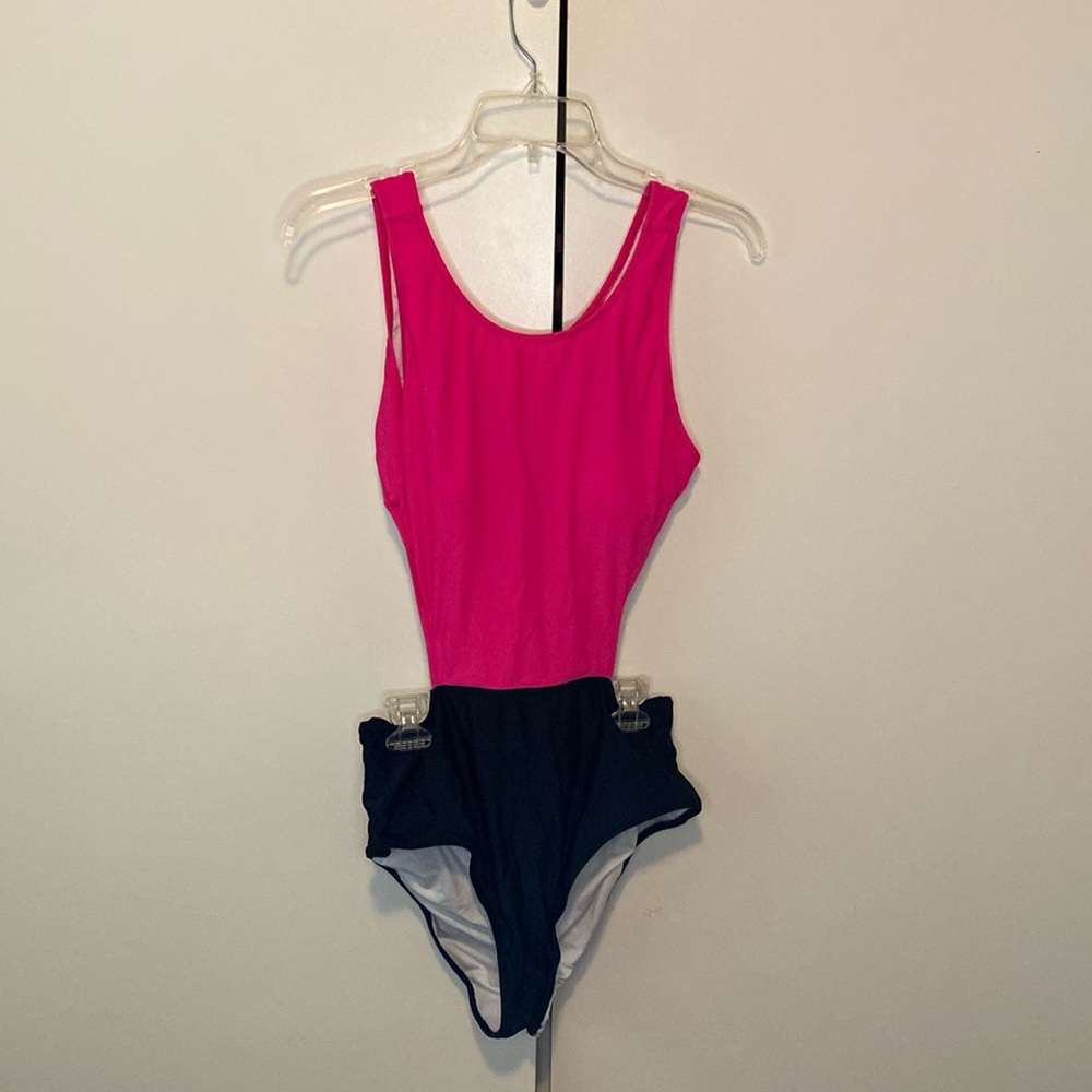Pink and black one piece cut out swimsuit.